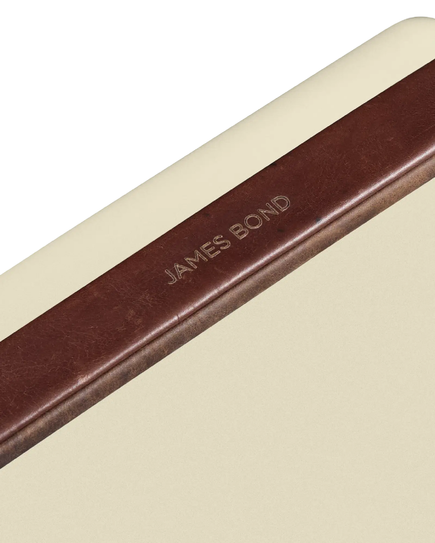 Close-up of a James Bond branded fieldbar cooler box on a beige background
