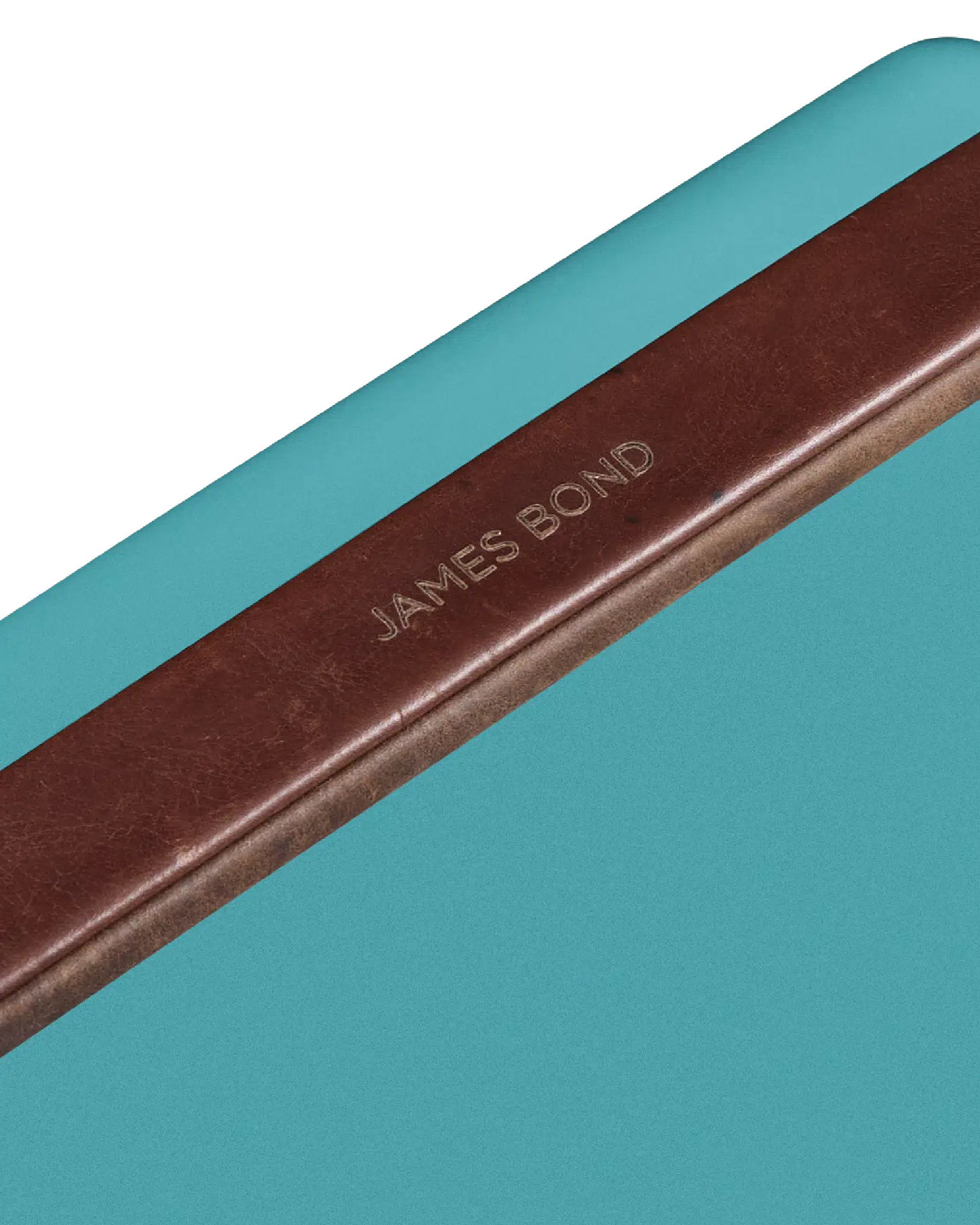 Brown leather strap with 'James Bond' engraving on a teal drinks box