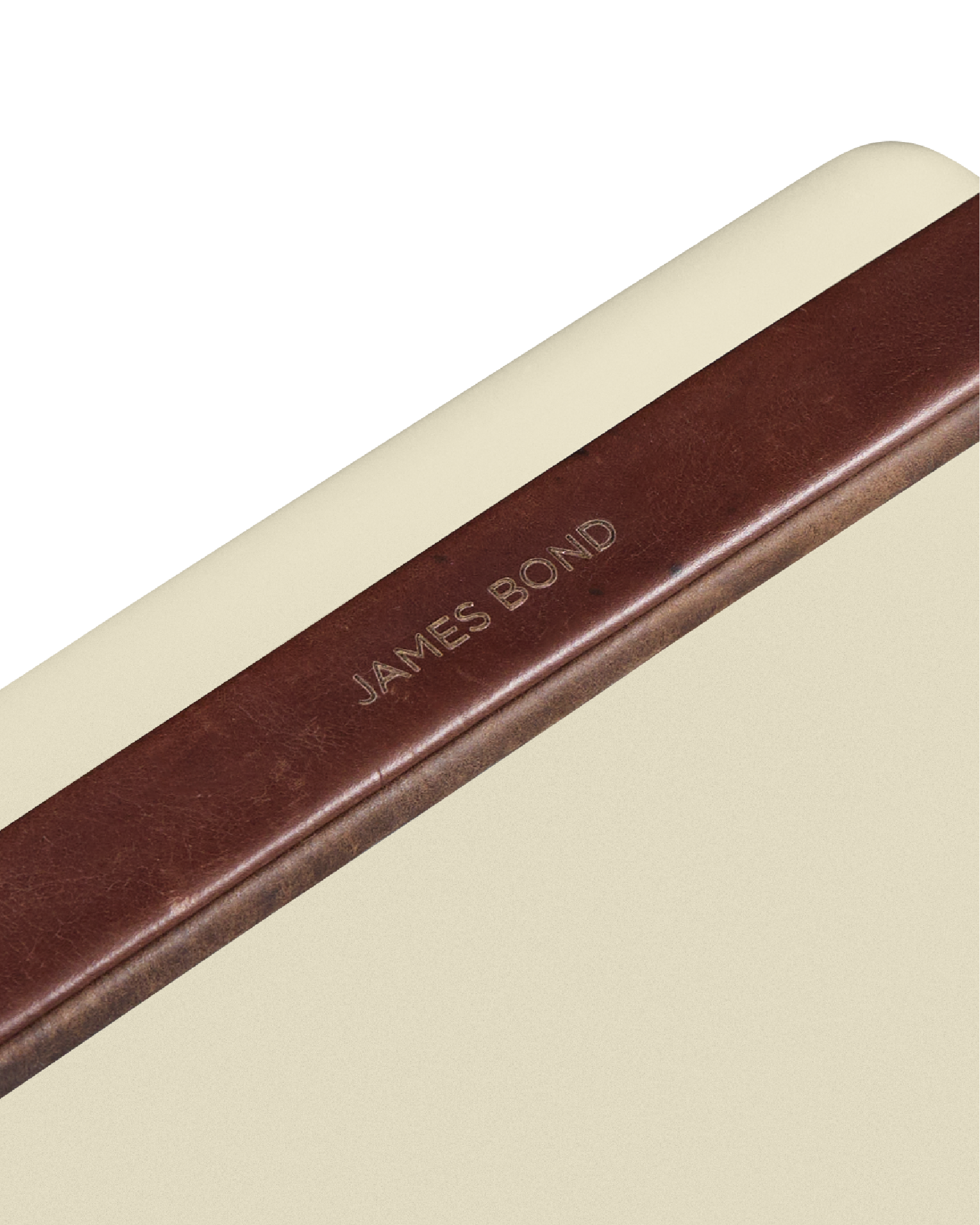 Close-up of a James Bond branded fieldbar cooler box on a beige background